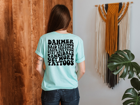 “Get More Tattoos” Cannibal Protection T-Shirt – Dark Humor Edition 🖤