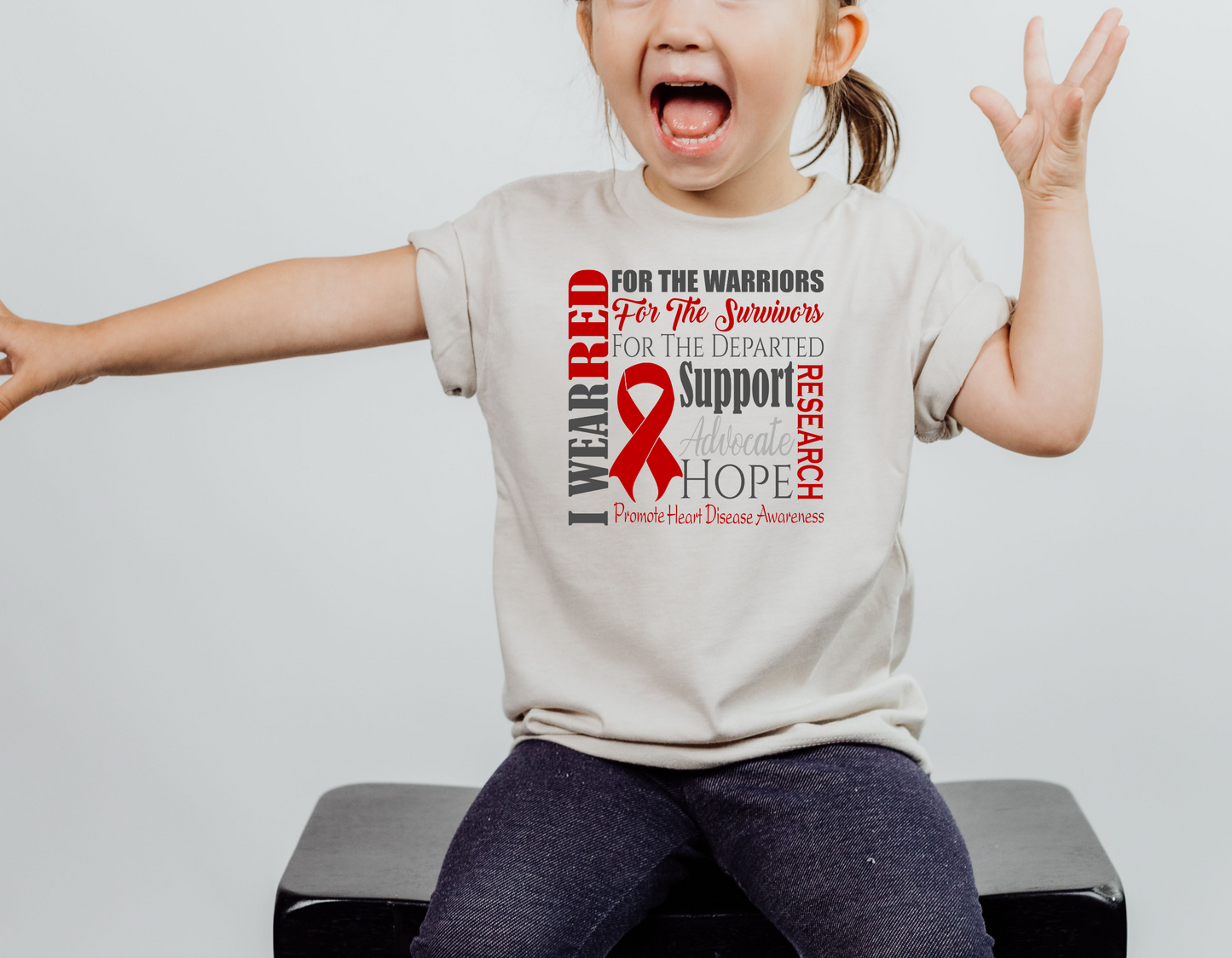 Support Heart Disease Awareness in Style with Our I Wear Red for CHD T-Shirt