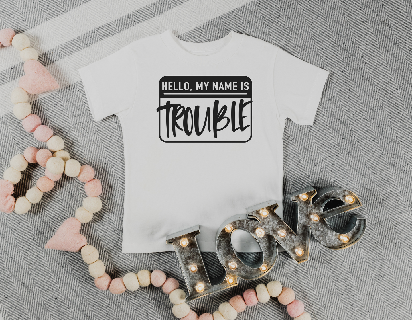 Make a Statement with Our 'Hello, I'm Trouble' Shirt: Express Your Bold and Confident Style