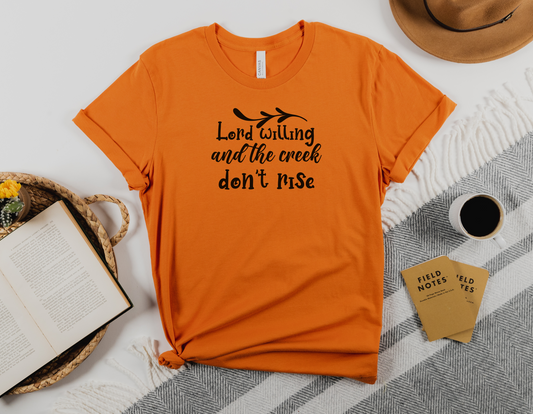 "Lord Willing and the Creek Don't Rise" T-Shirt - Show Your Resilience and Faith with Our Stylish Tee!