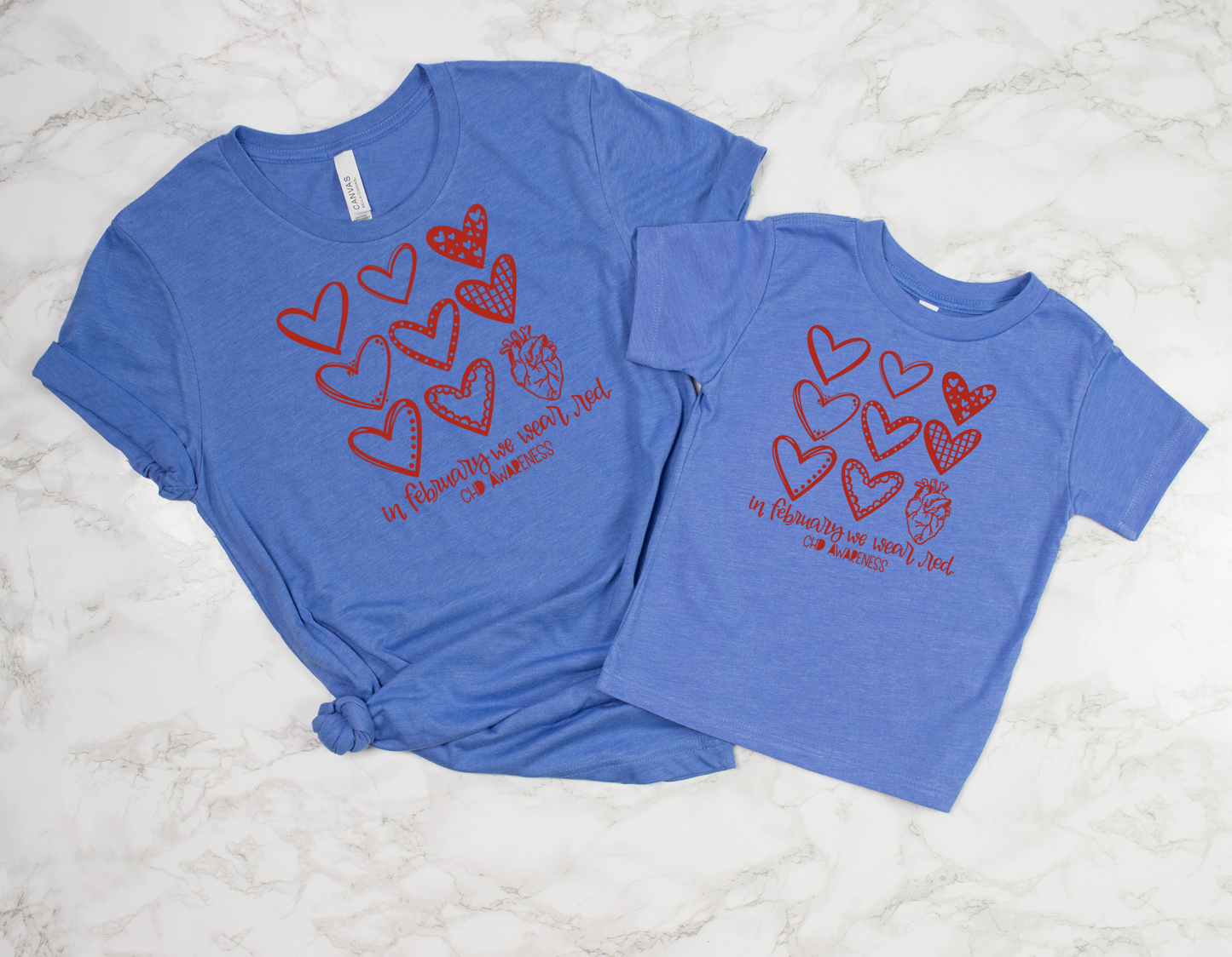 Show Your Support for CHD with Our Multi-Design Hearts CHD Awareness T-Shirt: "We Wear Red In February" Tee