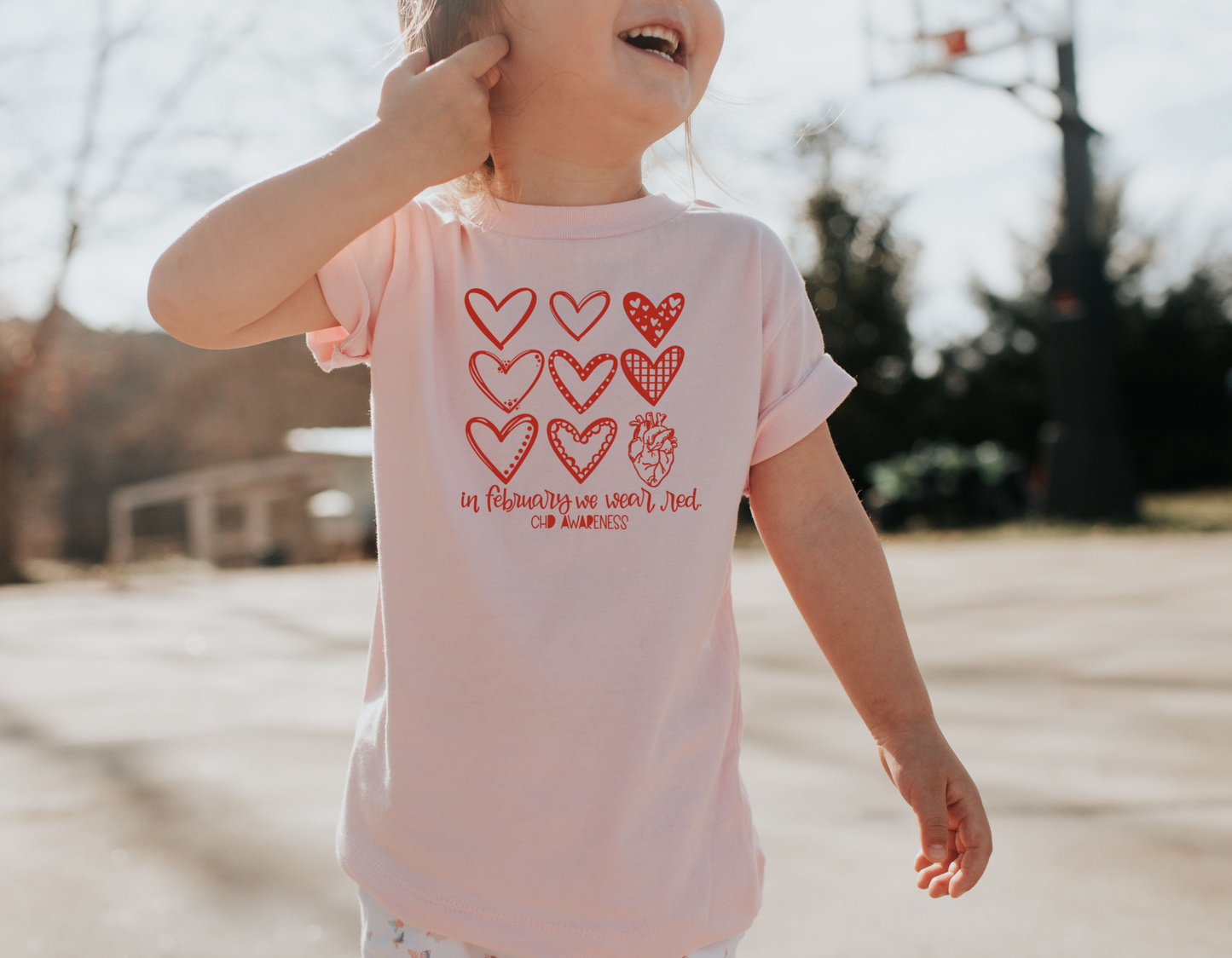 Show Your Support for CHD with Our Multi-Design Hearts CHD Awareness T-Shirt: "We Wear Red In February" Tee